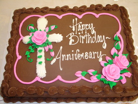 Happy Birthday and anniversary cake with sun and flowers at Cashmere Presbyterian Church.